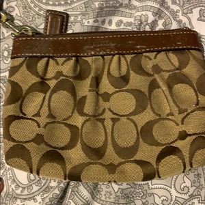 Tan coach wristlet